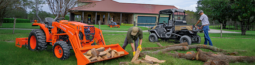 People working with wood with Kubota Equipment